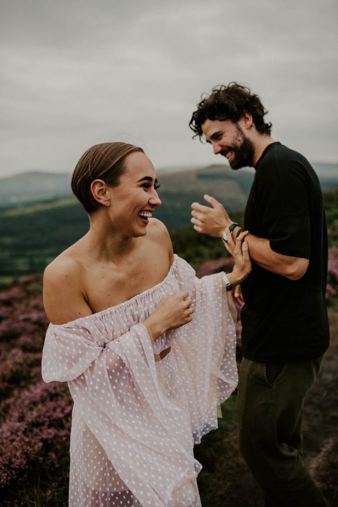 couple laughing in peak district national park