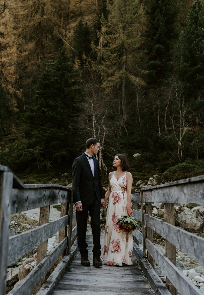Couple wedding portrait on bride in Austrian Alps